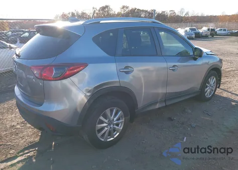 2014 Mazda Cx-5 Touring z USA, uszkodzony, nr VIN JM3KE4CY3E0393283